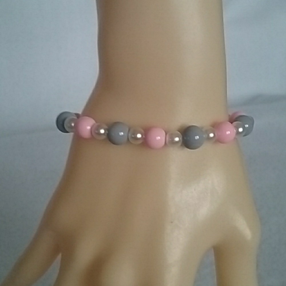 Pink, white, and gray beaded stretch bracelet